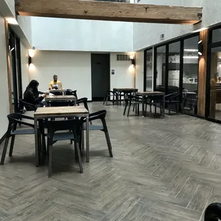 Seating in the corridor between businesses