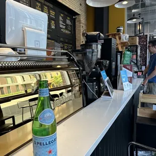 Seated at espresso bar