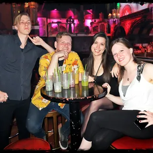 a group of people posing for a picture