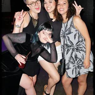 a group of women posing for a picture