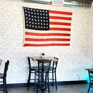 american flag hanging on the wall