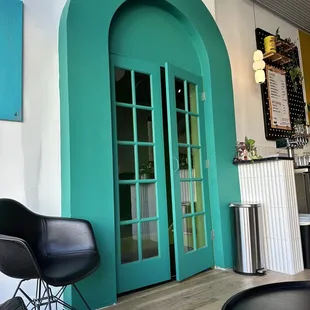 the entrance to a coffee shop