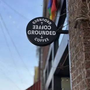 a sign on a brick building