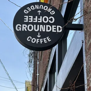 a sign for grounded coffee