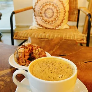 Eggnog latte and chocolate croissant
