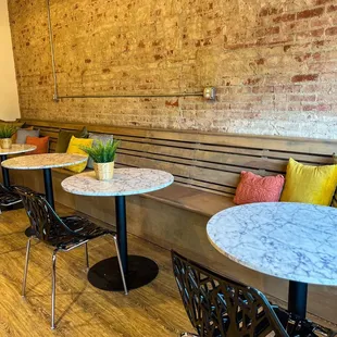 tables and chairs in a coffee shop