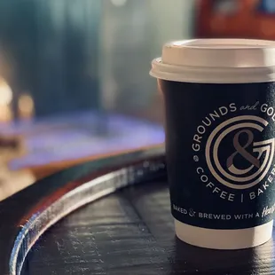 a cup of coffee on a table