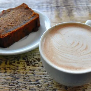 a cup of coffee and a piece of cake