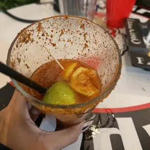 a person holding a bowl of food