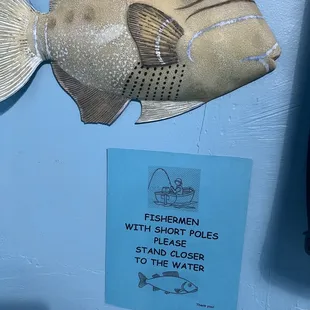 a fish and a sign