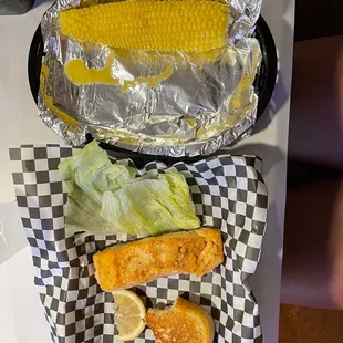 Salmon with a side of corn on the cob