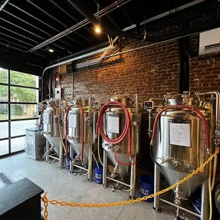a row of beer tanks