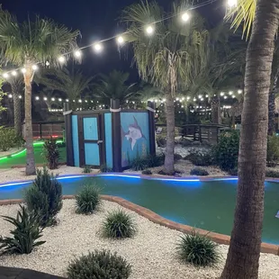 a mini golf course at night