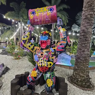 a statue of a man holding a sign