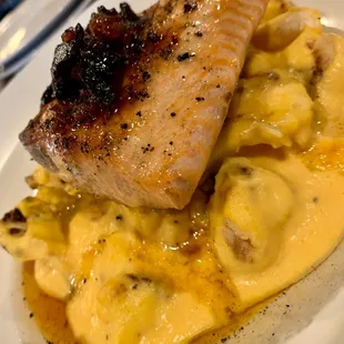 Maple bacon salmon on a bed of au gratin cauliflower.