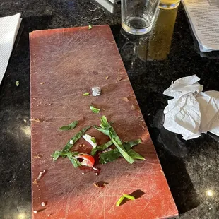 No plate or silverware just this board.  I sure hope they clean it before the next person uses it.