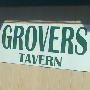 a sign for grovers tavern