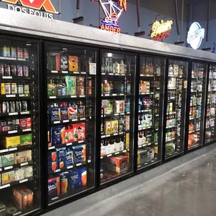 a row of liquor fridges