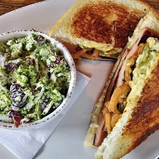 Bologna sandwich with broccoli salad.