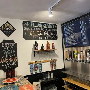a beer tap and a menu