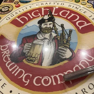 a man holding a beer