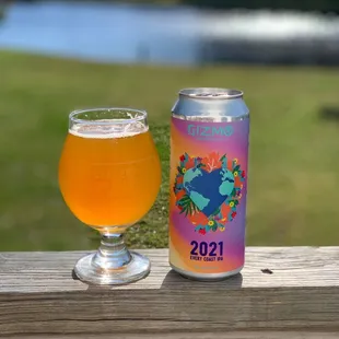 a can and a glass of beer