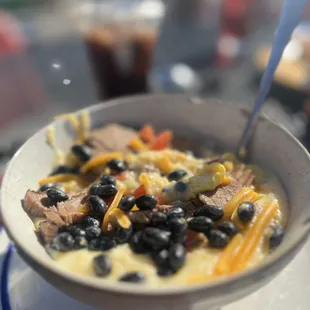 a bowl of soup with a spoon in it