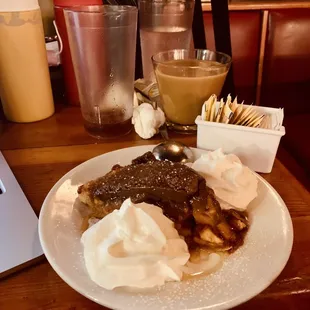 a plate of food and a laptop