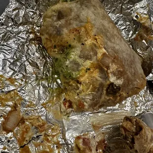 Husband had to eat his California burrito with a fork because the sour cream , salsa and avocado were all coming out of it.