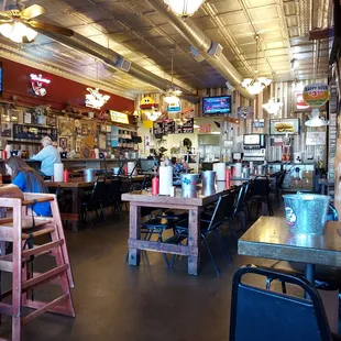 Sitting at a table by the window