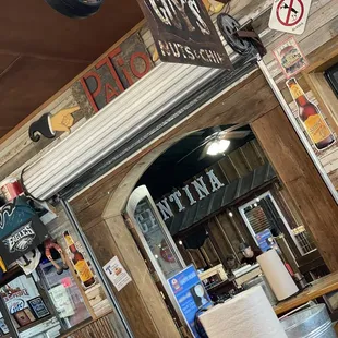 Party room in the back, lots of kitsch and fun decor. Check out the sweet Guys Nuts &amp; Chips sign!