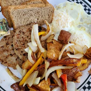 2 eggs over medium, potatoes (add onions, peppers), turkey sausage, toast