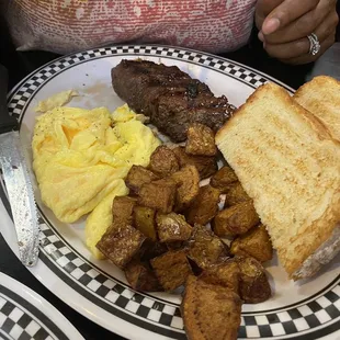 Steak &amp; Eggs w/ crispy potatoes and toast.