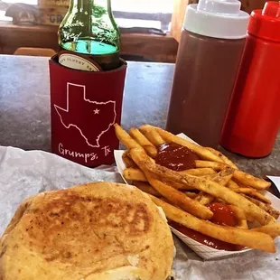 Bacon cheeseburger with Jalapeño bacon plus fries and not just regular ketchup but their house made jalapeño ketchup yummm
