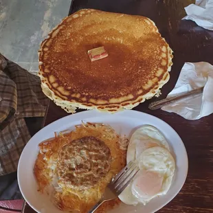 Hiker Breakfast included hashbrowns, 2 eggs, sausage patty,  and all you can eat pancakes that are bigger than your head! Delicious!