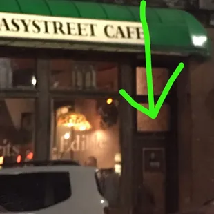 Sorry it&apos;s so blurry. Took this from the car. The arrow is pointing to the door you enter to get up to Grumpy Dave&apos;s.