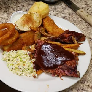 Side of slaw with a small portion of the Family Platter appetizer. Also, the 1/2 rack ribs. This is my wife&apos;s plate. She&apos;s neater than I! =D