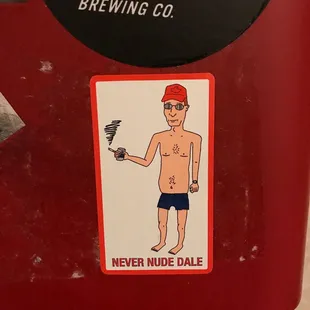 a man holding a beer