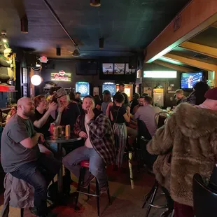 a group of people sitting at a table