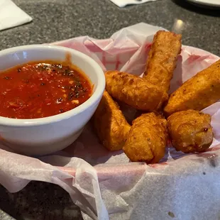 Mozzarella Cheese Sticks with homemade marinara sauce.