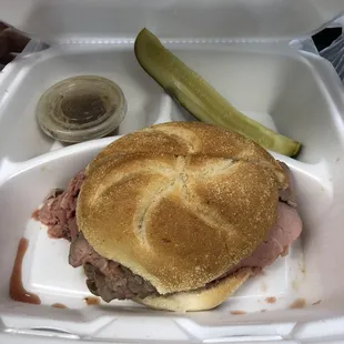 Roast beef sandwich with caramelized onions and blue cheese.