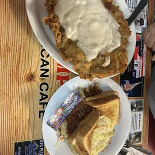 Hand Breaded Chicken Fried Steak with 2 eggs, hash browns, and toast