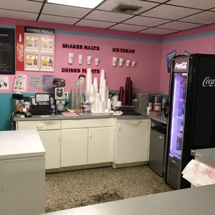 a pink and blue kitchen