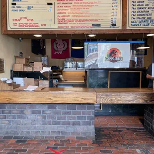a brick floor and counter