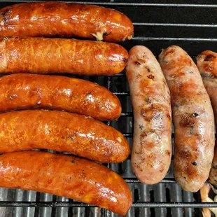 sausages on a grill