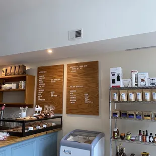 a counter with a small refrigerator