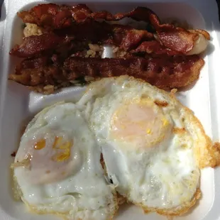Fried rice with bacon and overeasy eggs