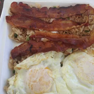 Fried rice with bacon and eggs overeasy