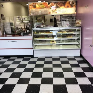 a bakery with a checkered floor