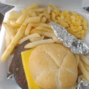 Fried Bologna Sandwich with cheese, lettuce, and tomato. and 2 sides. Portion size good. Food truck Friday at Columbus Urban League.